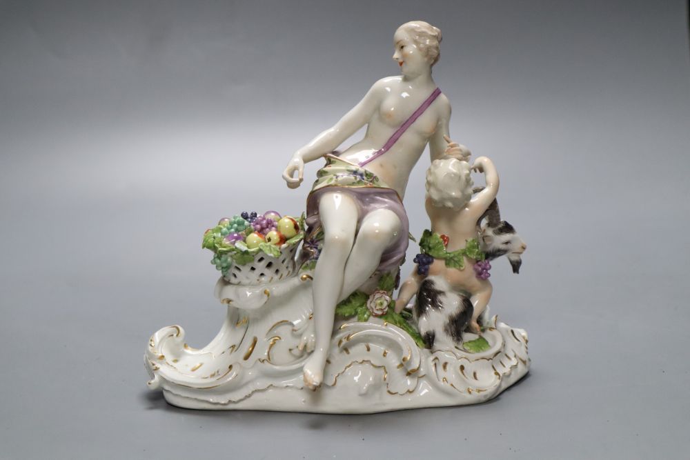 A 19th century Meissen group, Bacchante with putto and goat (damage), possibly part of a centrepiece